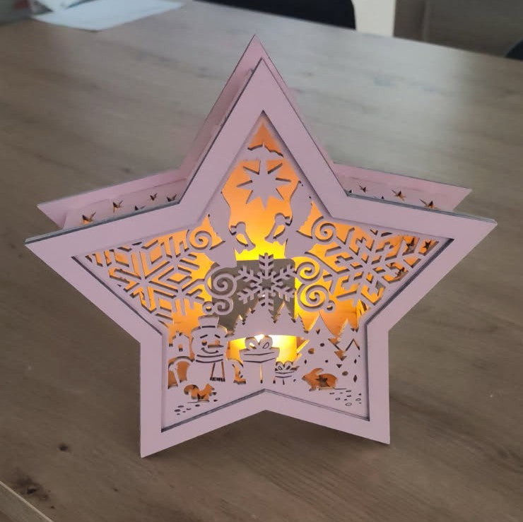 Étoile de Noël lumineuse en bois ✨🎄
Une décoration délicatement découpée qui révèle toute sa magie une fois illuminée. ❄️🎁